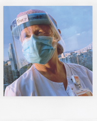 Nurse wearing face mask.